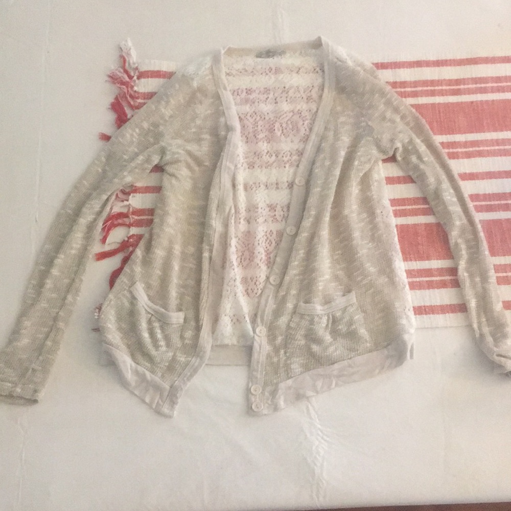 Small lace gold cardigan with buttons and pockets